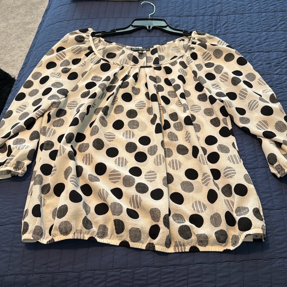 White & black polka dot shirt